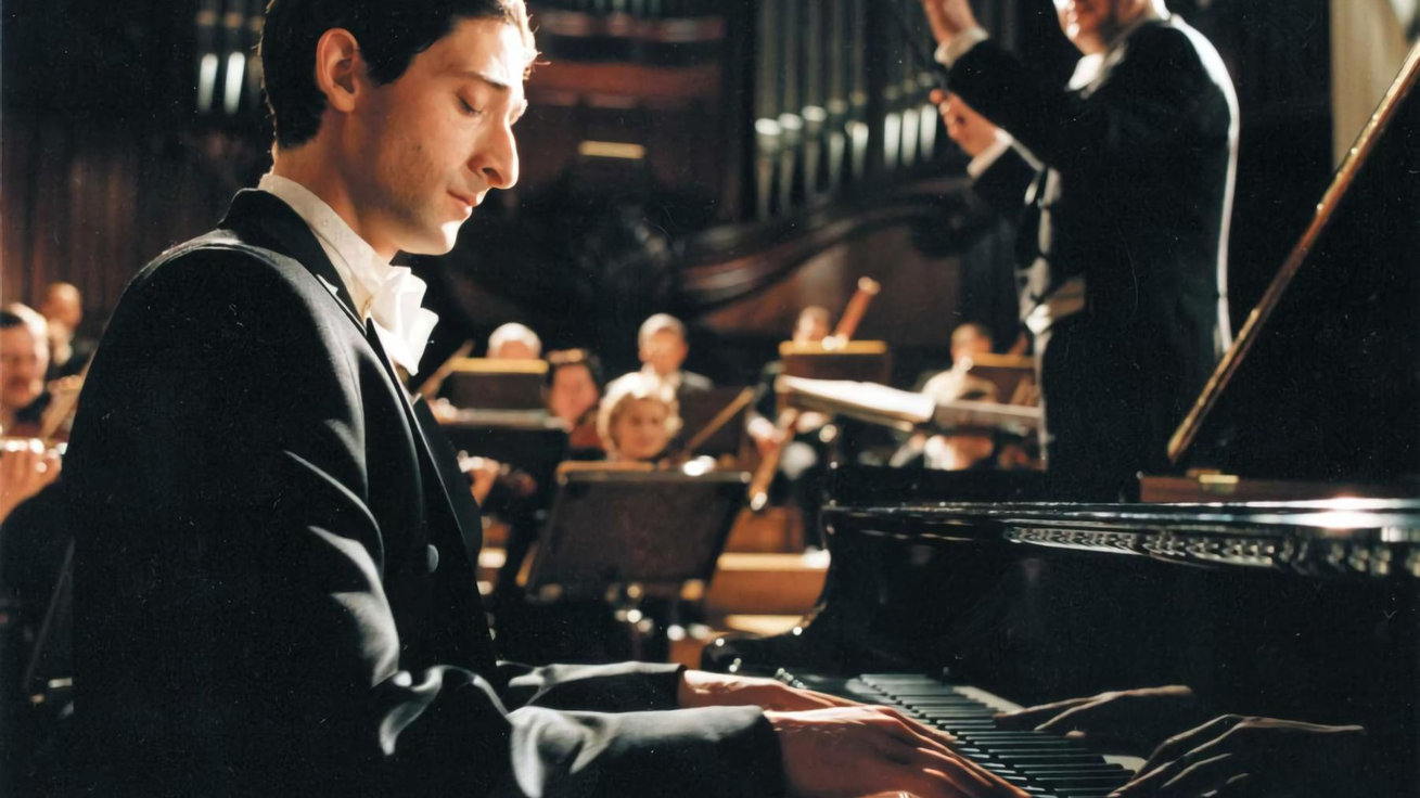 эдриан броуди пианист. девушка в шляпе. играй иностранную музыку. человек в наушниках. играй иностранную музыку.